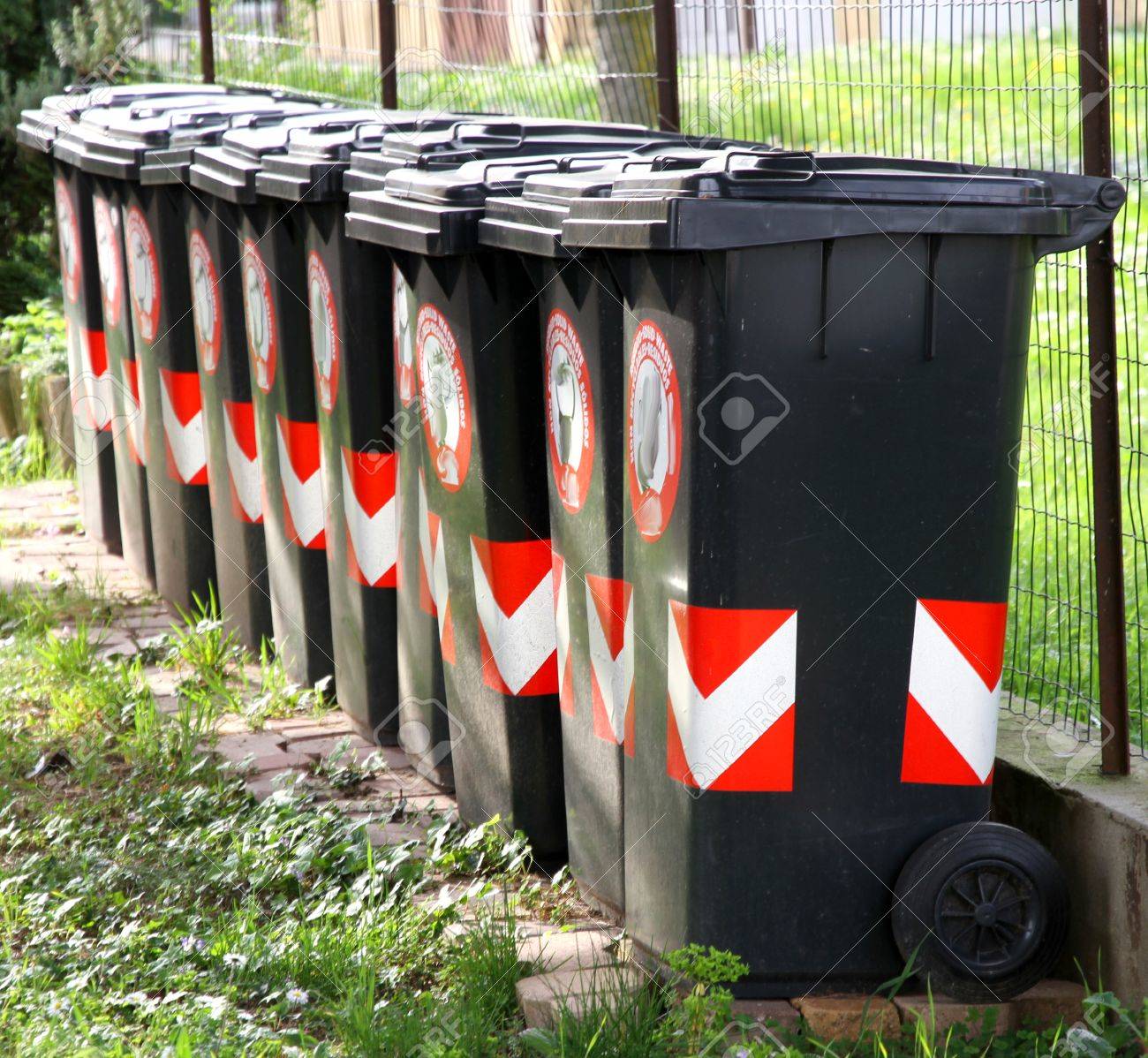 27243658-many-trash-bins-for-separate-waste-collection-of-municipal-solid-waste-in-the-city--Stock-Photo.jpg